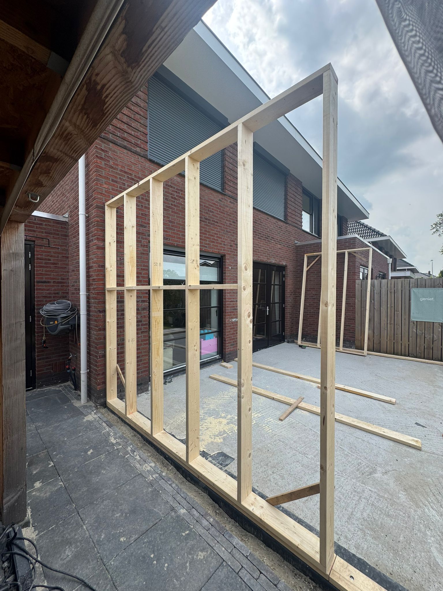 Uitbouw met schuifpui in moderne stijl